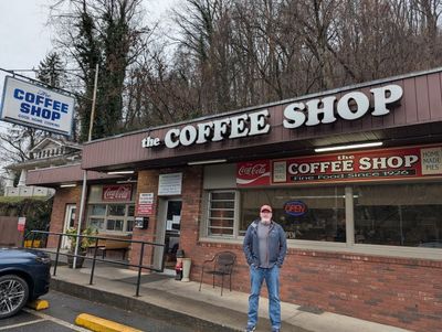 John outside the restaurant
