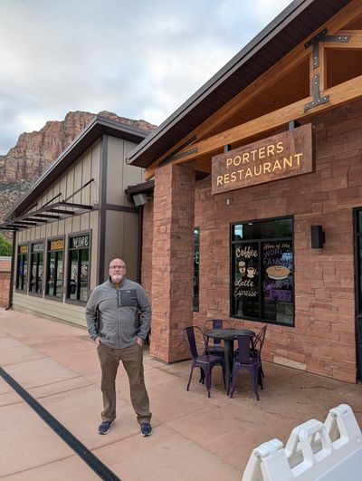 John in front of Porters