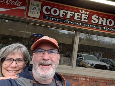 Anna and John outside the restaurant